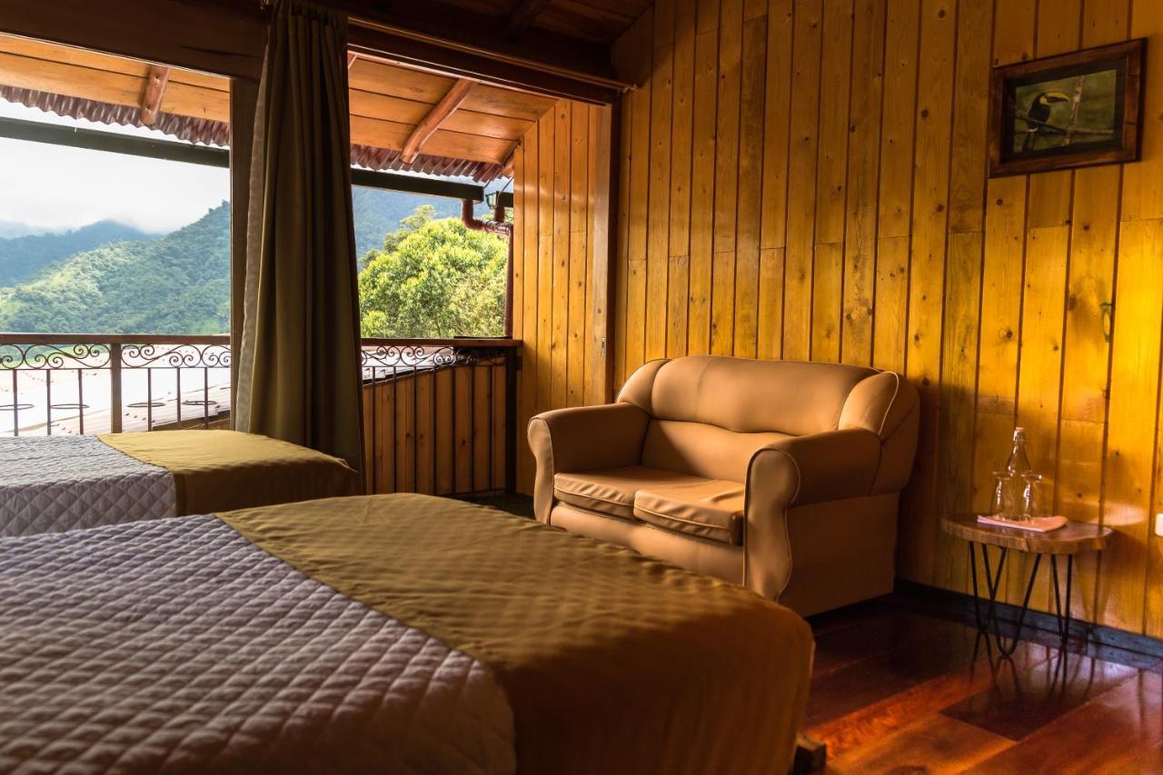 Hotel Casa De Vista Alta à Mindo Extérieur photo