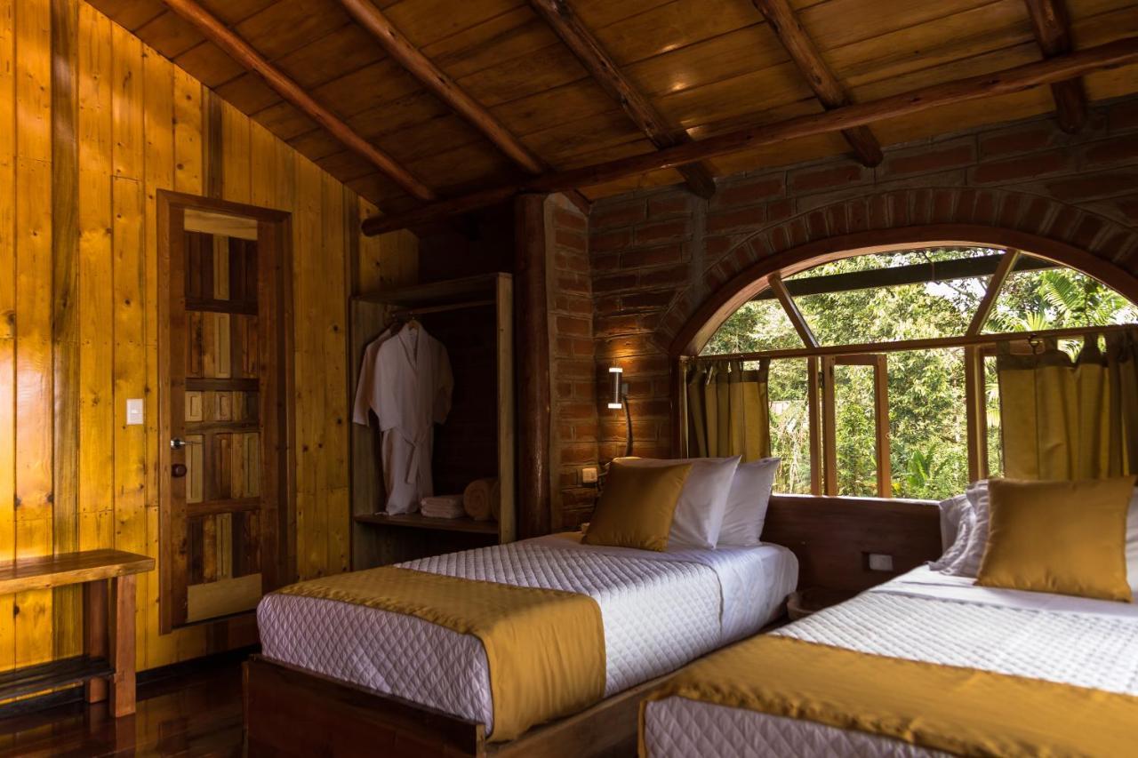 Hotel Casa De Vista Alta à Mindo Extérieur photo