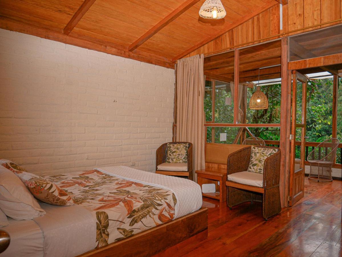 Hotel Casa De Vista Alta à Mindo Extérieur photo