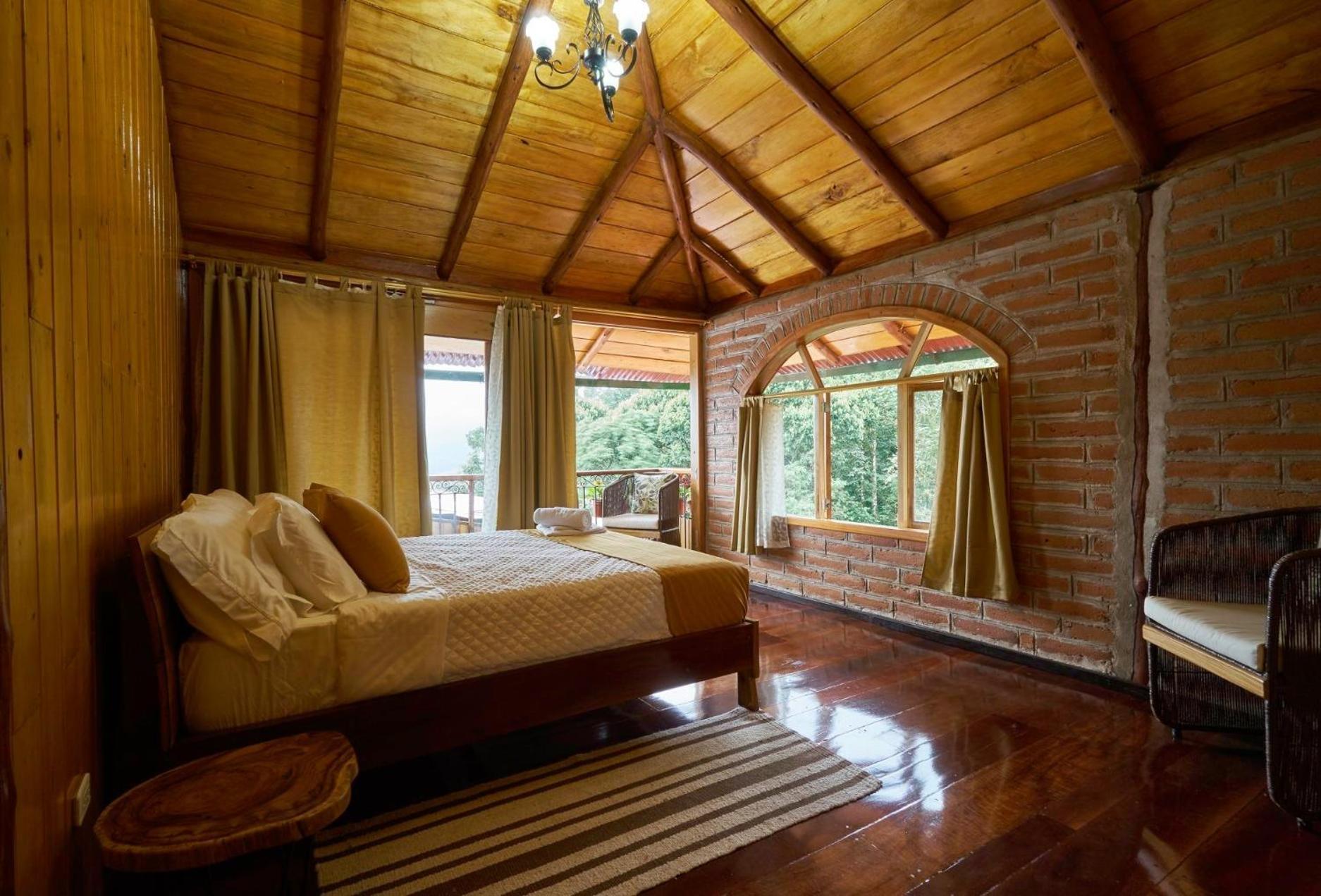 Hotel Casa De Vista Alta à Mindo Extérieur photo