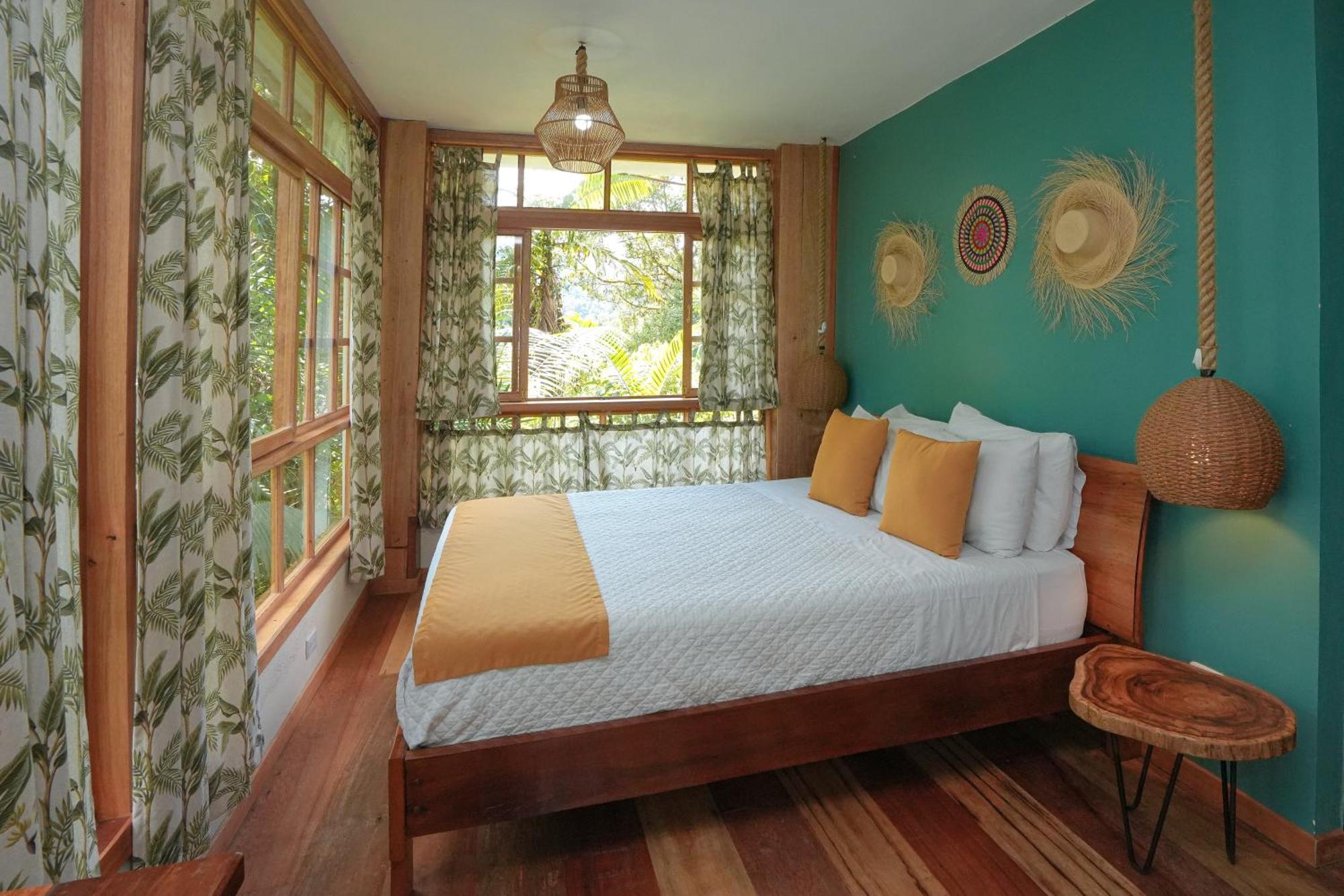 Hotel Casa De Vista Alta à Mindo Extérieur photo